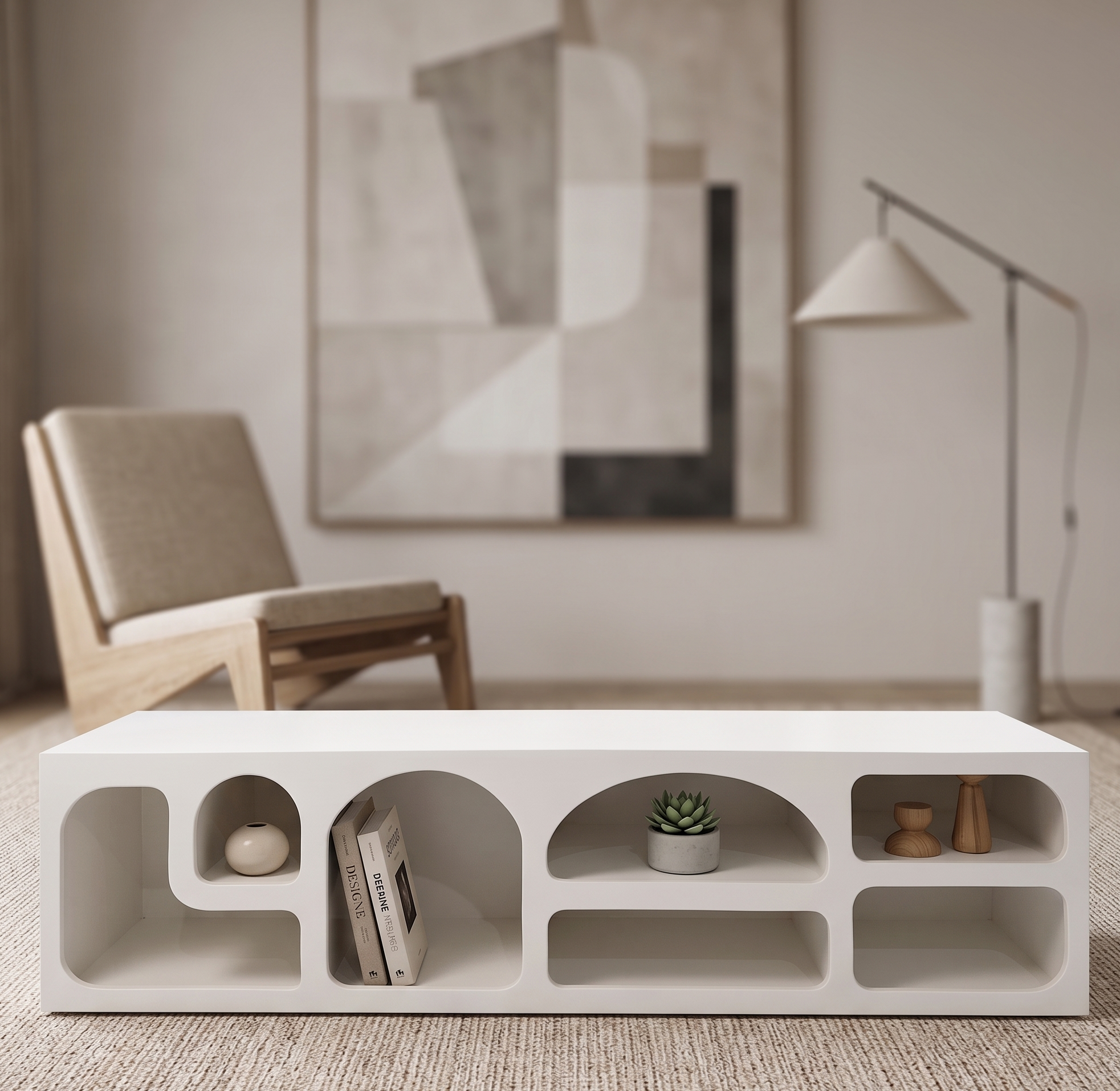 Modern living room with a concrete coffee table, chair, and abstract art.